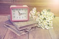 Alarm clock and old diary book Royalty Free Stock Photo