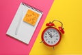 Alarm clock, pen, notebook and reminder note with phrase Don`t forget on color background, flat lay Royalty Free Stock Photo