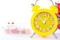 Alarm clock and pill box show medicine time