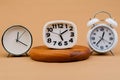 clock placed on a wooden stand, time work concept the value of limited time Appointments and punctuality at work Royalty Free Stock Photo