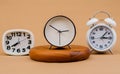 clock placed on a wooden stand, time work concept the value of limited time Appointments and punctuality at work Royalty Free Stock Photo