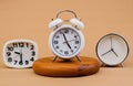 clock placed on a wooden stand, time work concept the value of limited time Appointments and punctuality at work Royalty Free Stock Photo