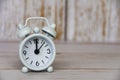Alarm clock pointing at 12 o'clock with customizable space for ideas or text. Copy space Royalty Free Stock Photo