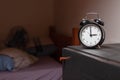 Alarm clock in a retro style shot at home. Royalty Free Stock Photo