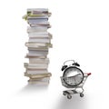 Alarm clock in shopping cart, stack of books, white background Royalty Free Stock Photo