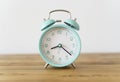 Alarm clock on the table background. Morning time and beginning of the day, timing, deadline concept Royalty Free Stock Photo