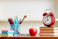 Alarm Clock On Top Of Books On Table Royalty Free Stock Photo