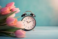 Alarm clock with tulips, switch to daylight saving time in spring, summer time changeover Generative AI.