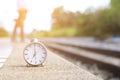 alarm clock Watch outdoor alone at train station