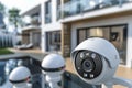 Alarm systems secure monitored environments within protective safety networks, ensuring guarded and shielded camera surveillance.
