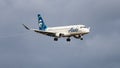 Alaska Airlines Embraer ERJ 170-200 jet on final approach