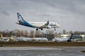 Alaska Airlines Embraer ERJ 170-200 jet landing at Everett Paine Field