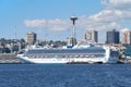 Alaska-bound cruise ship in Seattle with Space Needle in the background