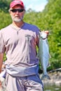 Alaska - Man with Sockeye Salmon