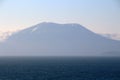 Alaska, Mount Edgecumbe rises out of the fog