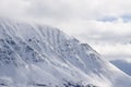 Alaska. Mountains. Winter landscape with snow and blue sky.