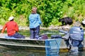 Alaska - People Fishing with Bears