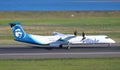 Alaska Q400 Takes Off of Runway 10L Royalty Free Stock Photo