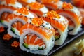 Alaska Salmon Uramaki Sushi, Uramaki Rolls Japanese Food with Red Tobiko Closeup Royalty Free Stock Photo