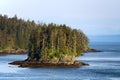 Alaska, small tree-covered island in the Sitka Sound Royalty Free Stock Photo