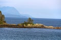 Alaska, small vegetated island in Sitka Sound Royalty Free Stock Photo