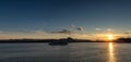 Alaska, USA - June 22 , 2018: Panoramic shot of Celebrity Infinity sailing at sunset in one of the Alaskan Fjords. Beautiful