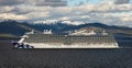 ALASKA, USA - June 13, 2023 - Princess Cruises ship Discovery Princess cruises the waters near Ketchikan, Alaska with snow-capped Royalty Free Stock Photo