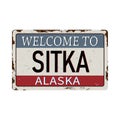 Welcome to sitka alaska vintage rusty metal sign on a white background, vector illustration