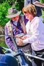 Alaska - Woman Fishing, Guide Helping Royalty Free Stock Photo