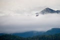 Alaskan Float Plane Flying Through Clouds