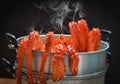 Alaskan King Crab Cooked steamer food on steaming pot seafood and lettuce vegetable with dark background - red crab hokkaido Royalty Free Stock Photo