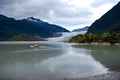 Alaskan Landscape with Melting Glacier in the Valley between two mountains Royalty Free Stock Photo