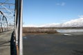 Alaskan mountains and old bridge Royalty Free Stock Photo