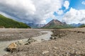 An Alaskan River Runs Through A Gravel Flat Royalty Free Stock Photo