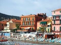 ALASSIO SAVONA, ITALY - SEPTEMBER 2019: Beautiful view on a sunny day of the sea and the town of Alassio with colorful buildings