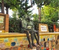 Alassio Savona, ITALY - SEPTEMBER, 2017: `Muretto di Alassio`, famous Wall in Alassio with bronze statue of the lovers