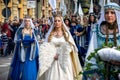 Participants in historic dresses on Medieval Parade in Alba, Italy.