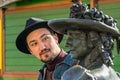 ALBA IULIA, ROMANIA - February 28, 2019: A young tourist man admiring the beautiful statues inside the Alba Carolina Citadel in