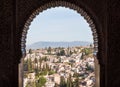 Albacin old town roofs top view from the stucco decoration window in Mexuar section in Nasrid palace, Alhambra castle, Andalusia, Royalty Free Stock Photo