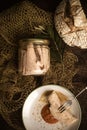 Albacore canned in glass jar with olive oil, vertical image