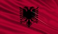 Albania flag design. Waving Albanian flag made of satin or silk fabric.