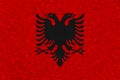 Albania flag on styrofoam texture