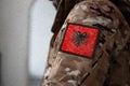 Albania Soldier. Soldier with flag Albania, Albania flag on a military uniform. Camouflage clothing Royalty Free Stock Photo