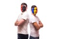 Albania vs Romania. Football fans of national teams before match on white background. Royalty Free Stock Photo