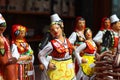 Albanian clay toys figurines of women and men in traditional oriental costumes. Culture, souvenirs.