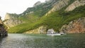 Albanian ferry, river Drin in middle of amazing mountains