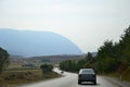 Albanian mountain road with Mercedes. Royalty Free Stock Photo