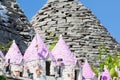 Alberobello, Apulia - Miniatures of Trulli with pink rooftops