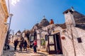 Alberobello, Italy - March 9, 2019: View of the streets of this curious Italian city visited by thousands of tourists