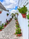 Alberobello, Italy, September 2024. Traditional trulli houses street.